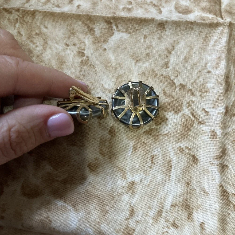 1950s–1960s dome clip-on earrings Gray Plastic Gold Rimmed Cage Backing Style 1